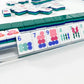 Oh My Mahjong shangri la  tile set face design side layers player face design collection poolside on mat with shufflers on rack and pusher